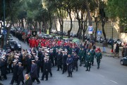Blue color of the uniforms of the Navy, Green of the commandos, Red of the numerous Fire Brigade Divers